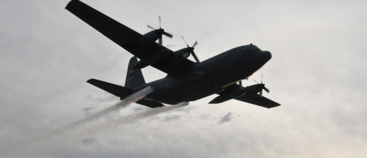 C-130H Hercules spraying pesticide over Houston.